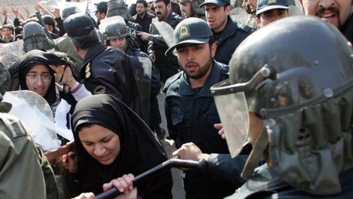 Iranian riot policemen prevent demonstra