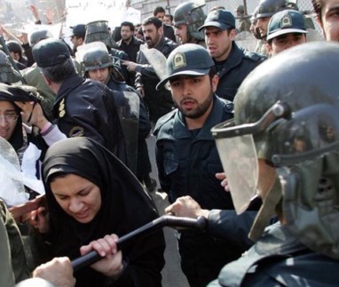 Iranian riot policemen prevent demonstra