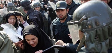 Iranian riot policemen prevent demonstra