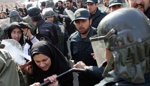 Iranian riot policemen prevent demonstra