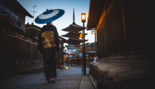 Beautiful japanese senior woman walking in the village. Typical japanese traditional lifestyle