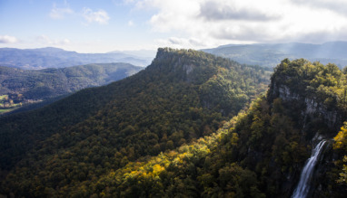 Autumn in Salt De Coromina waterfall, La Garrotxa, Spain