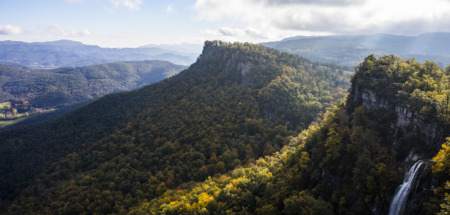 Autumn in Salt De Coromina waterfall, La Garrotxa, Spain