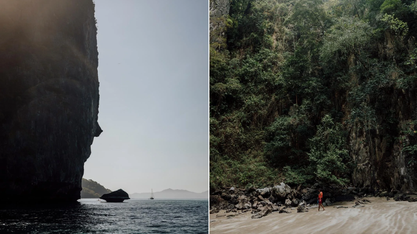 Imposante kalkstenen kliffen bij zee en een reiziger op een verscholen zandstrand omringd door jungle op Koh Muk in Thailand.