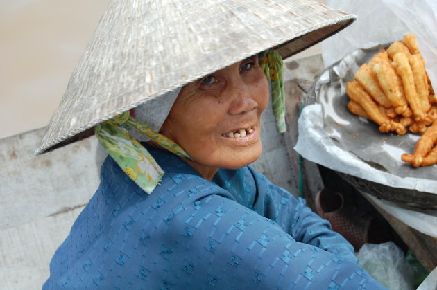 verkoopster op de Mekong