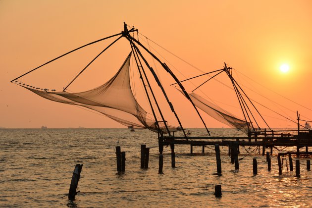 Chinese visnetten bij zonsondergang