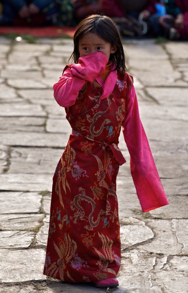 Meisje op festival in Bumthang-regio
