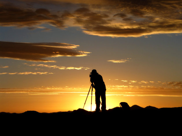 fotograaf op de Salar de Uyuni
