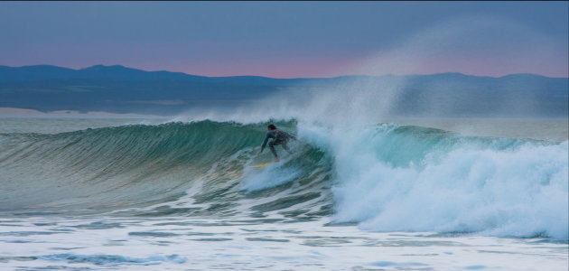 Surfer bij Jeffrey's Bay