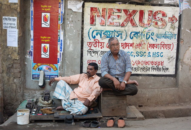 The shoe repairer on Shankhari Bazar