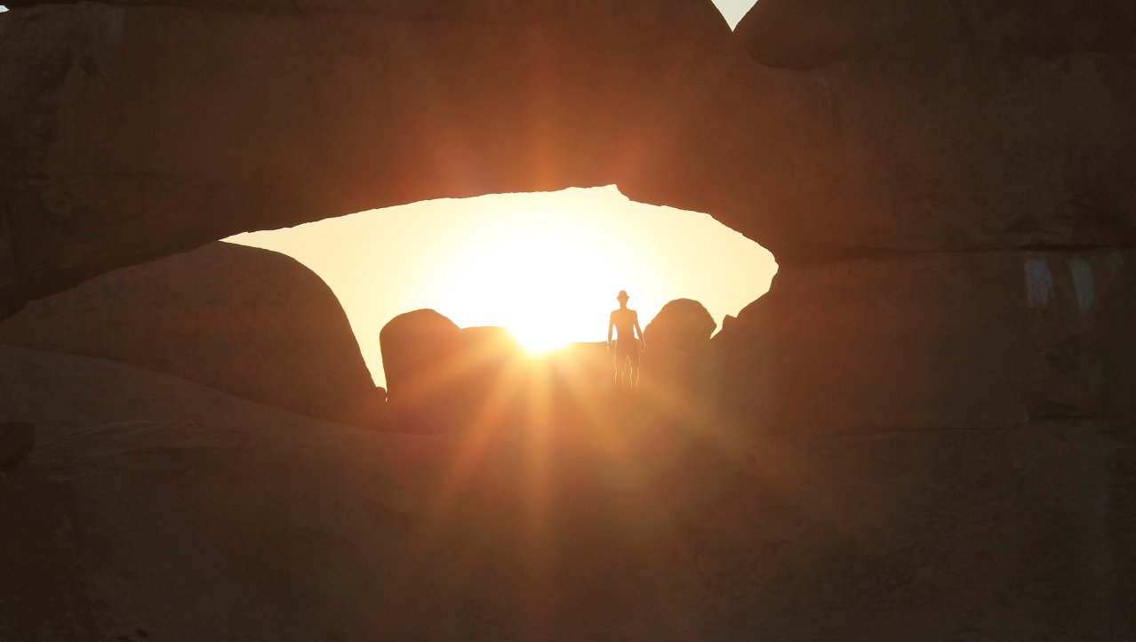 Standing in the Rock Arch @ Sunset