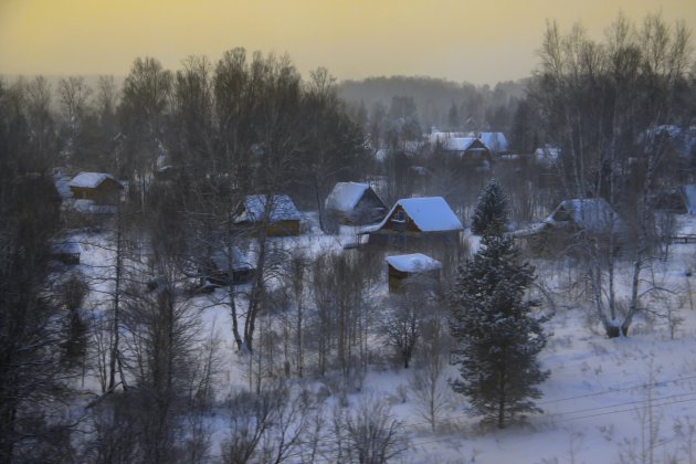 Winters dorpje in Siberië