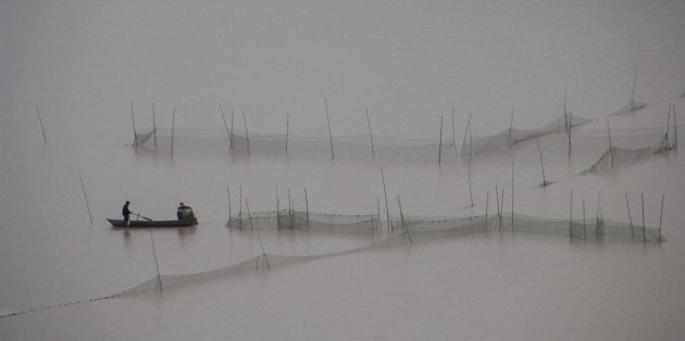 Vroege vissers in Tulin
