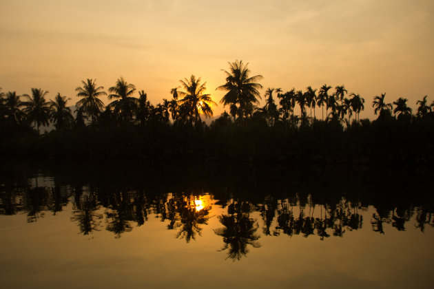 Een zonsondergang boottocht in Kampot